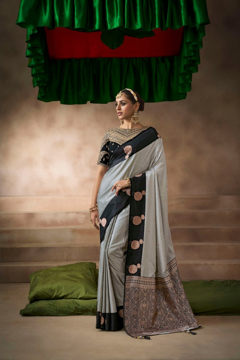 Satin Silk Saree Paired with Heavily Embroidered Raw Silk Blouse